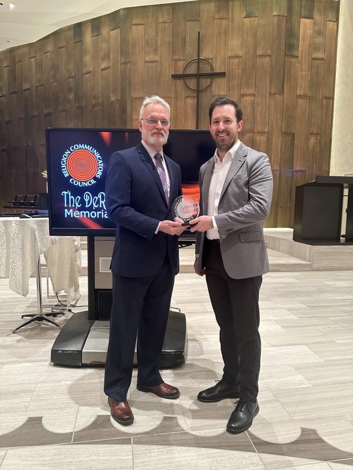 Steven Havira receiving award