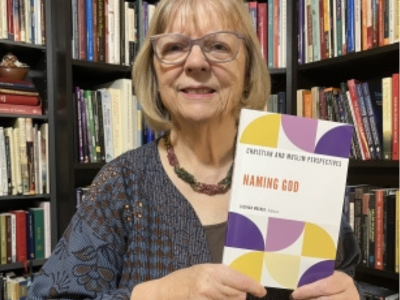 Lucinda holding her book